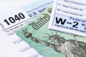 Small business tax service with image of US federal tax forms